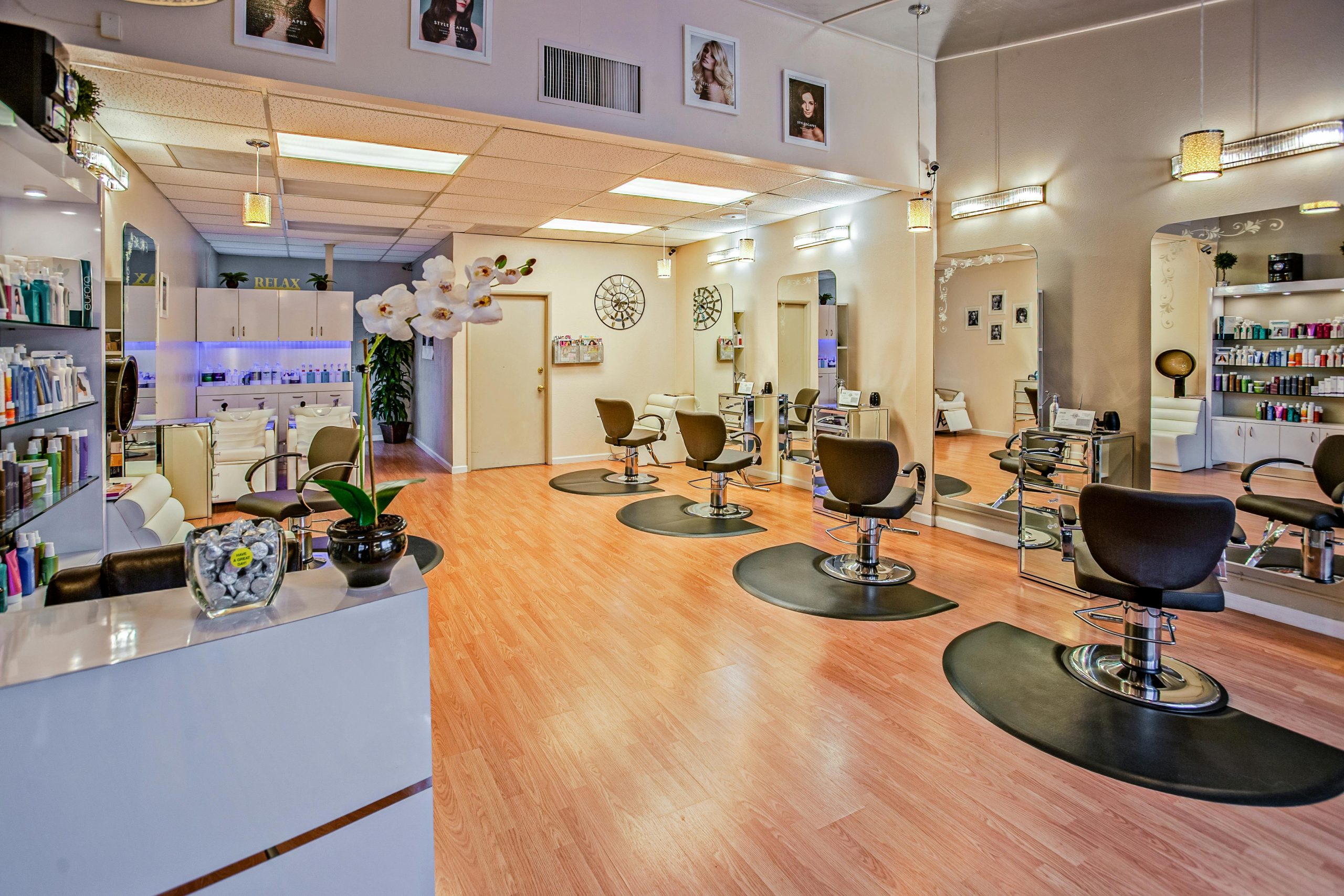 Spacious and stylish hair salon interior in Del Mar, CA showcasing chic design.